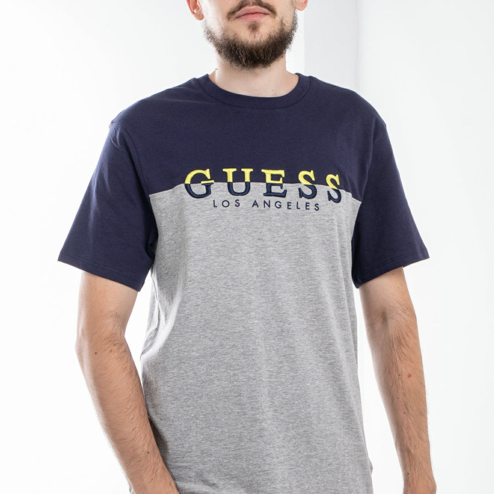
                      
                        Tricou GUESS cu logo frontal IMBRACAMINTE GUESS Gri XS 761839173012
                      
                    